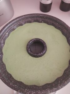 Pandan cake batter in the baking pan