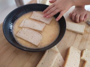 bread into eggs mixture